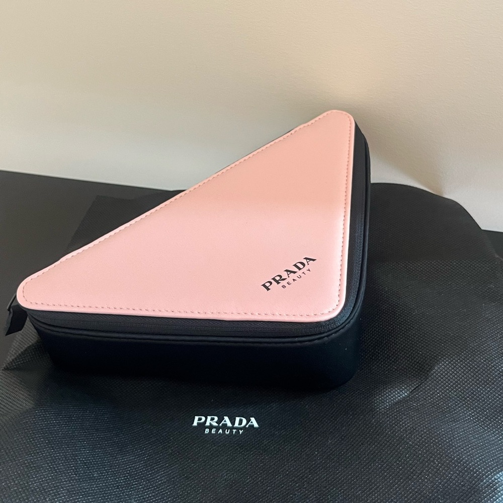 Prada triangle cosmetics bag /case cute pouch/clutch  Brand new w dust bag!